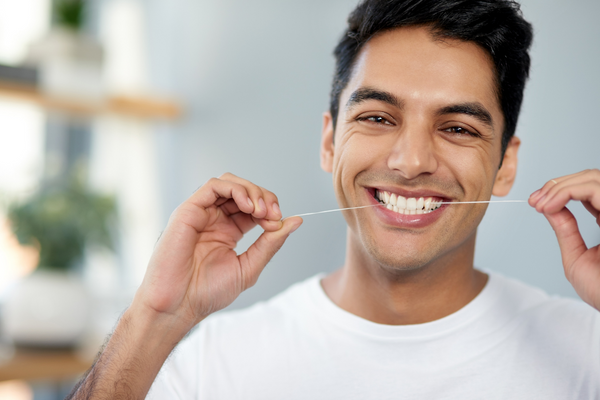 How To Floss The Right Way Bakersfield Dentist